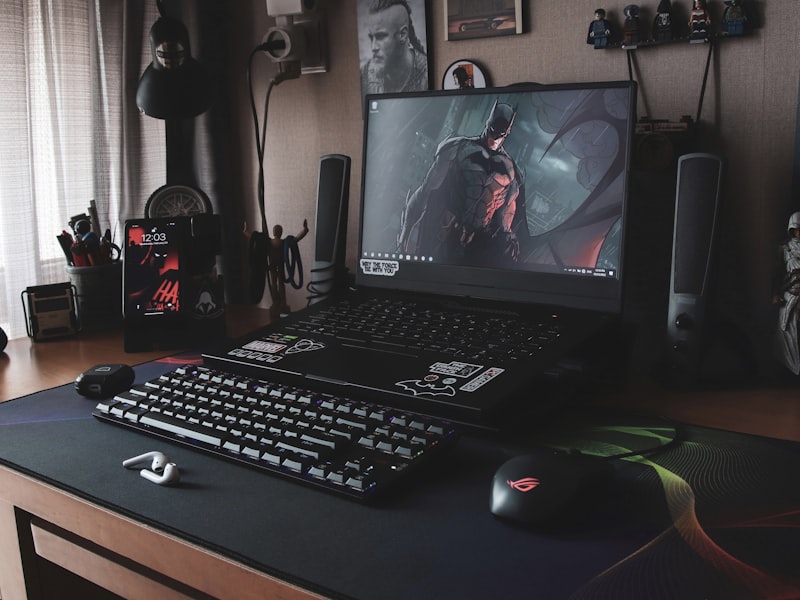 Corner battlestation with triple-monitor setup